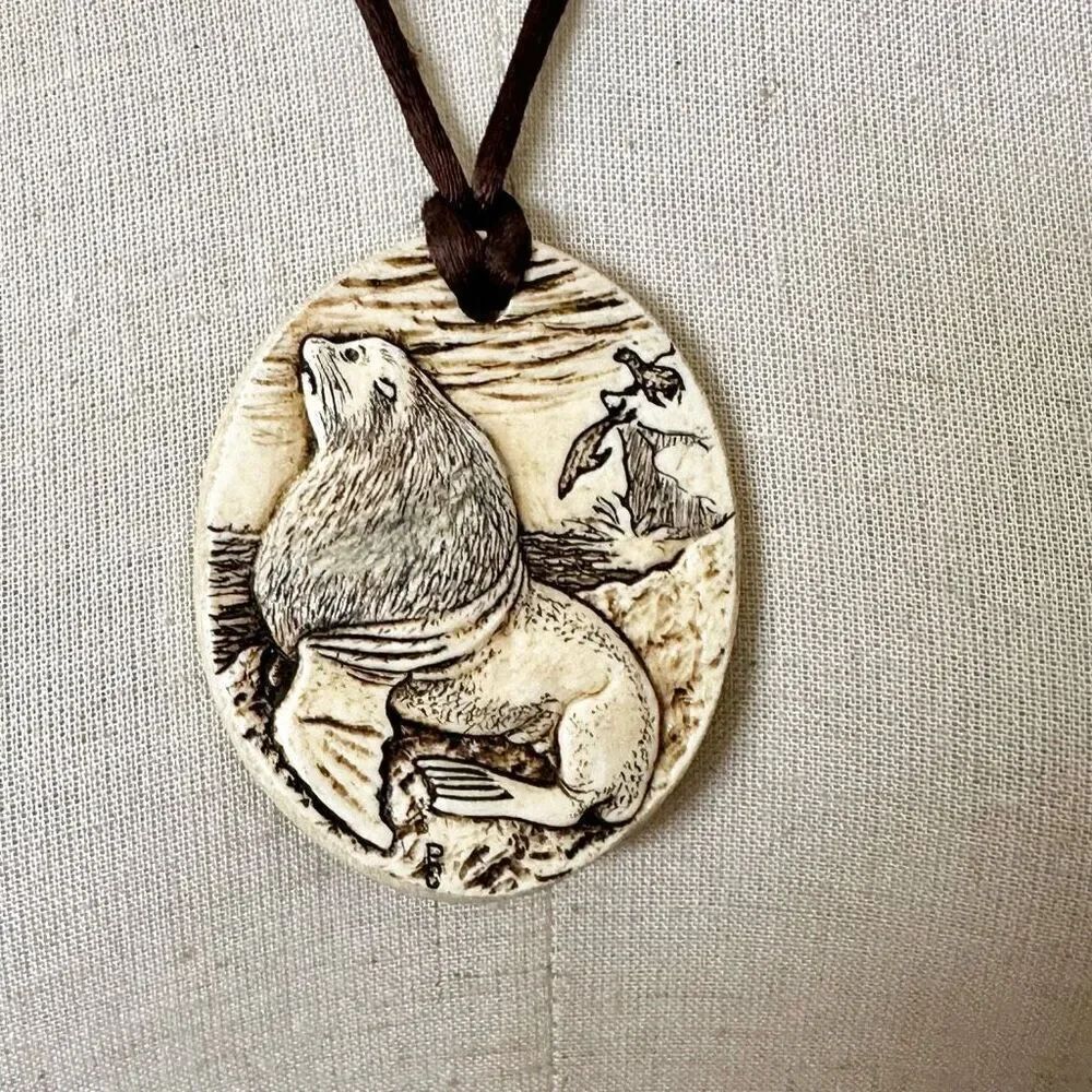Cream and black carved seal pendant necklace